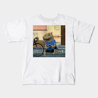 Capybara drinking on the pavement Kids T-Shirt